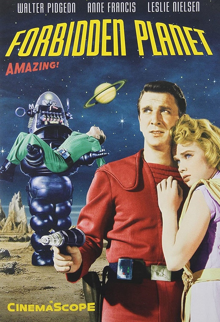 ¡Morocho! Nielsen, junto a Anne Francis, en el afiche de "El planeta prohibido", su primer éxito, de 1956.